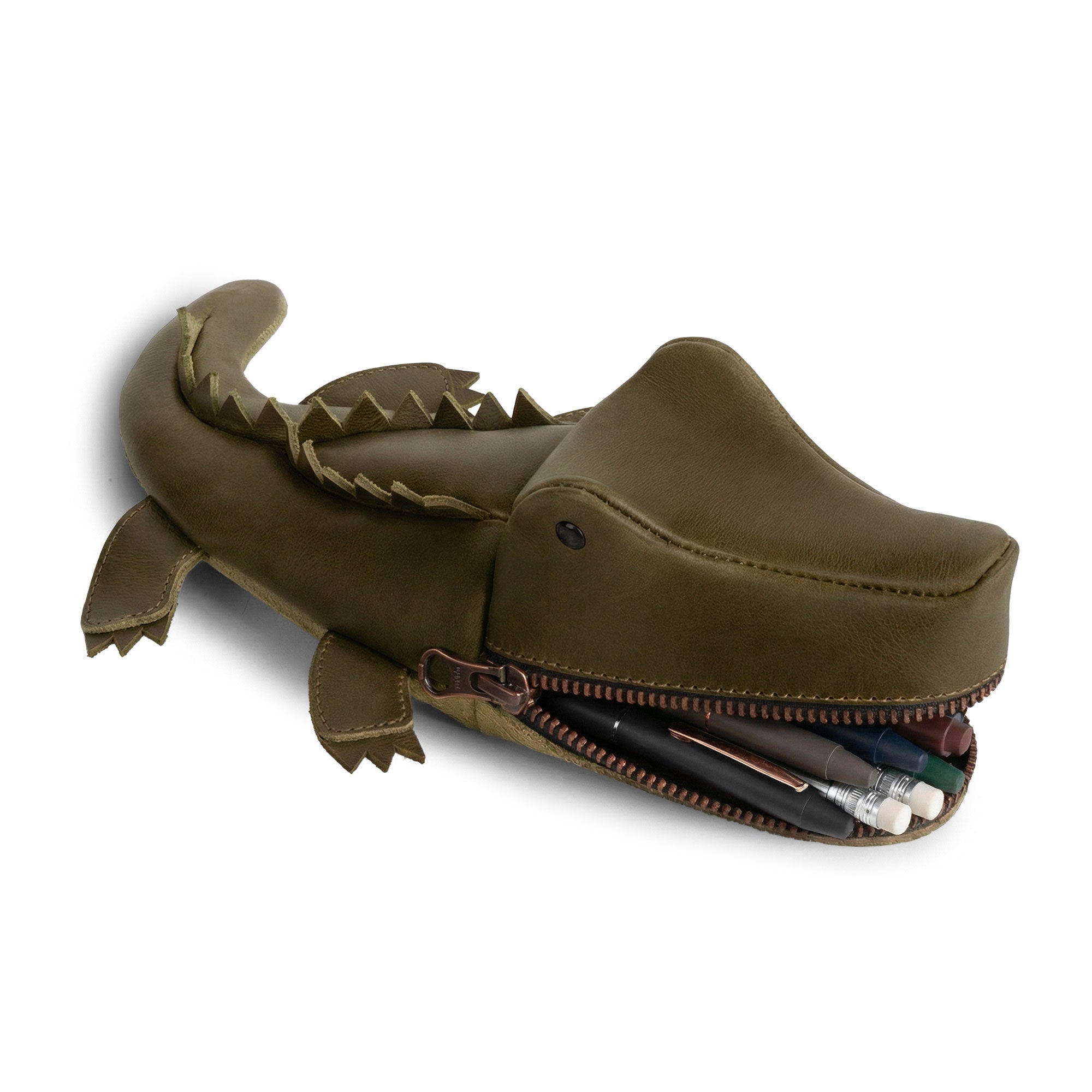 Gator Leather Pouch by Tudi Frudi, featuring a crocodile-shaped pencil pouch design, ideal for storing pens, pencils, small charger cables, or using as a change bag. This artisan-made pouch is crafted from full grain leather, showcasing small batch production and handmade quality from La Antigua Guatemala and Oaxaca Mexico.