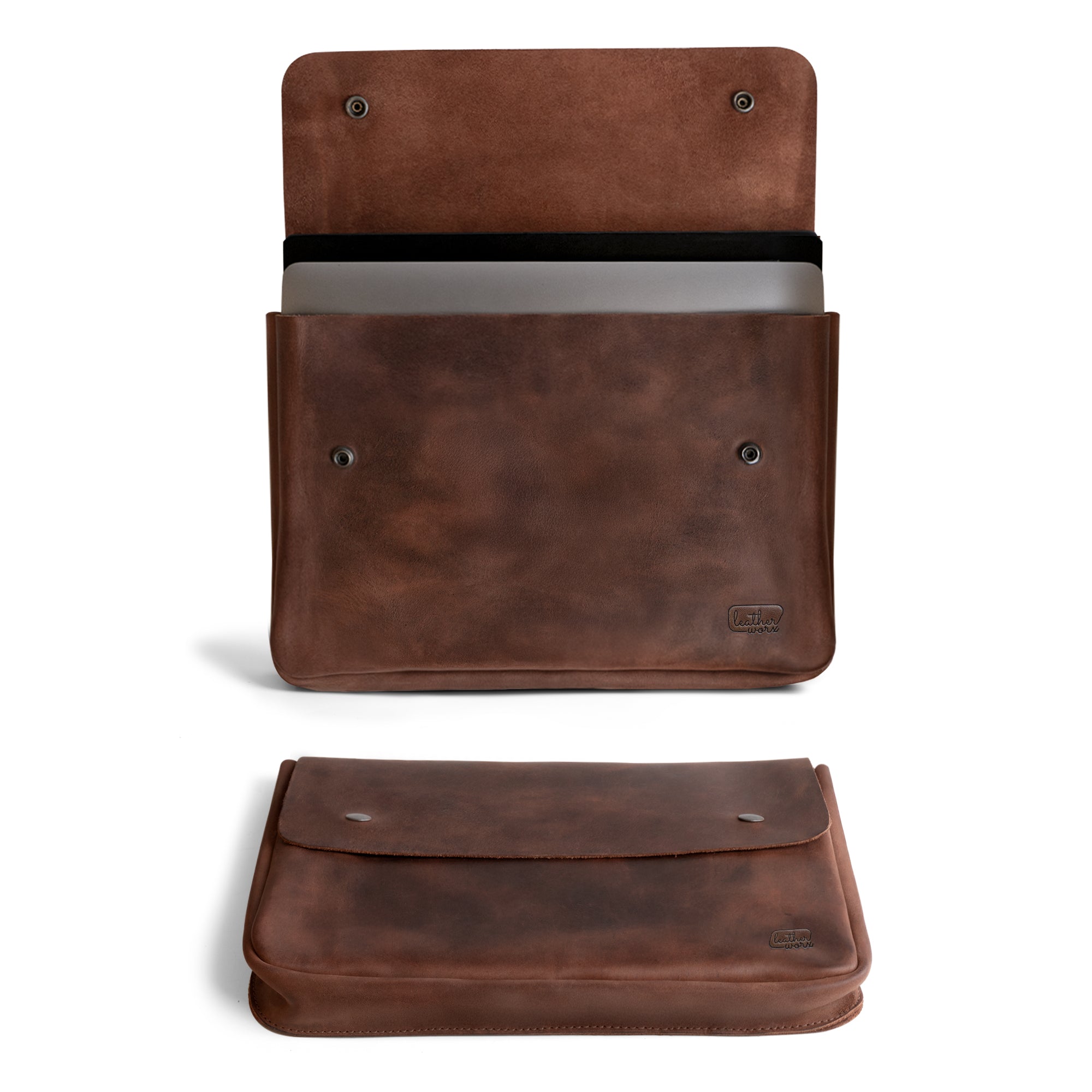 Leather Worx Folder Document Holder showcasing a sleek design, handmade from full grain leather. This vintage folder document holder is perfect for carrying files, serving as a document portfolio and binder strapless carry on bag, ideal for office and work essentials. Crafted with care in La Antigua Guatemala, it reflects small batch production with hand cut and hand sewn techniques, and features fire branded artisan craftsmanship.