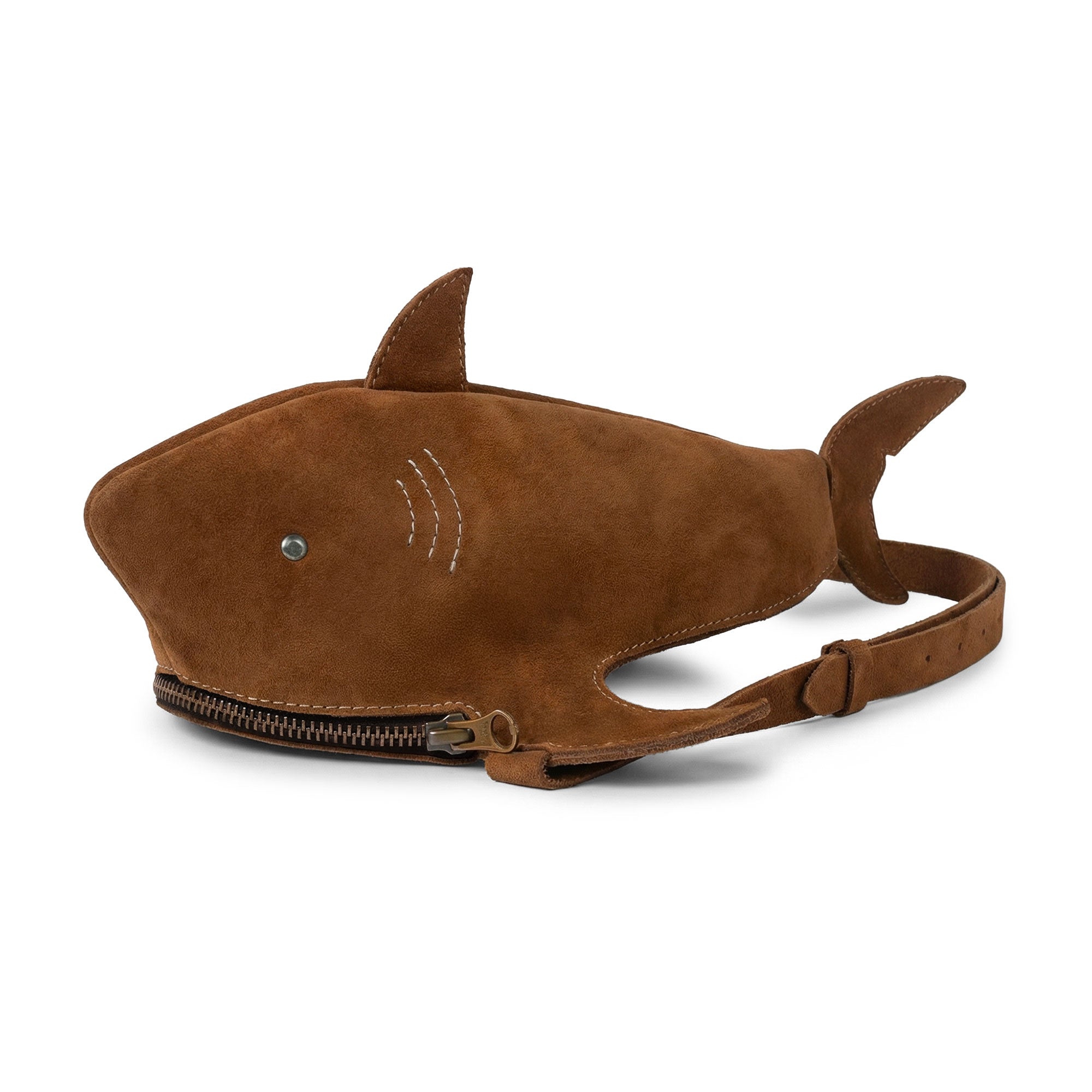 Stylish Shark-Shaped Shoulder Bag by Tudi Frudi, crafted from Full Grain Leather. This versatile bag features an adjustable strap, perfect for wearing as a crossbody or messenger bag. Handmade in La Antigua Guatemala, it embodies artisan craftsmanship with every piece being hand cut and hand sewn. Ideal for unique style lovers, this compact bag is spacious enough for essentials.