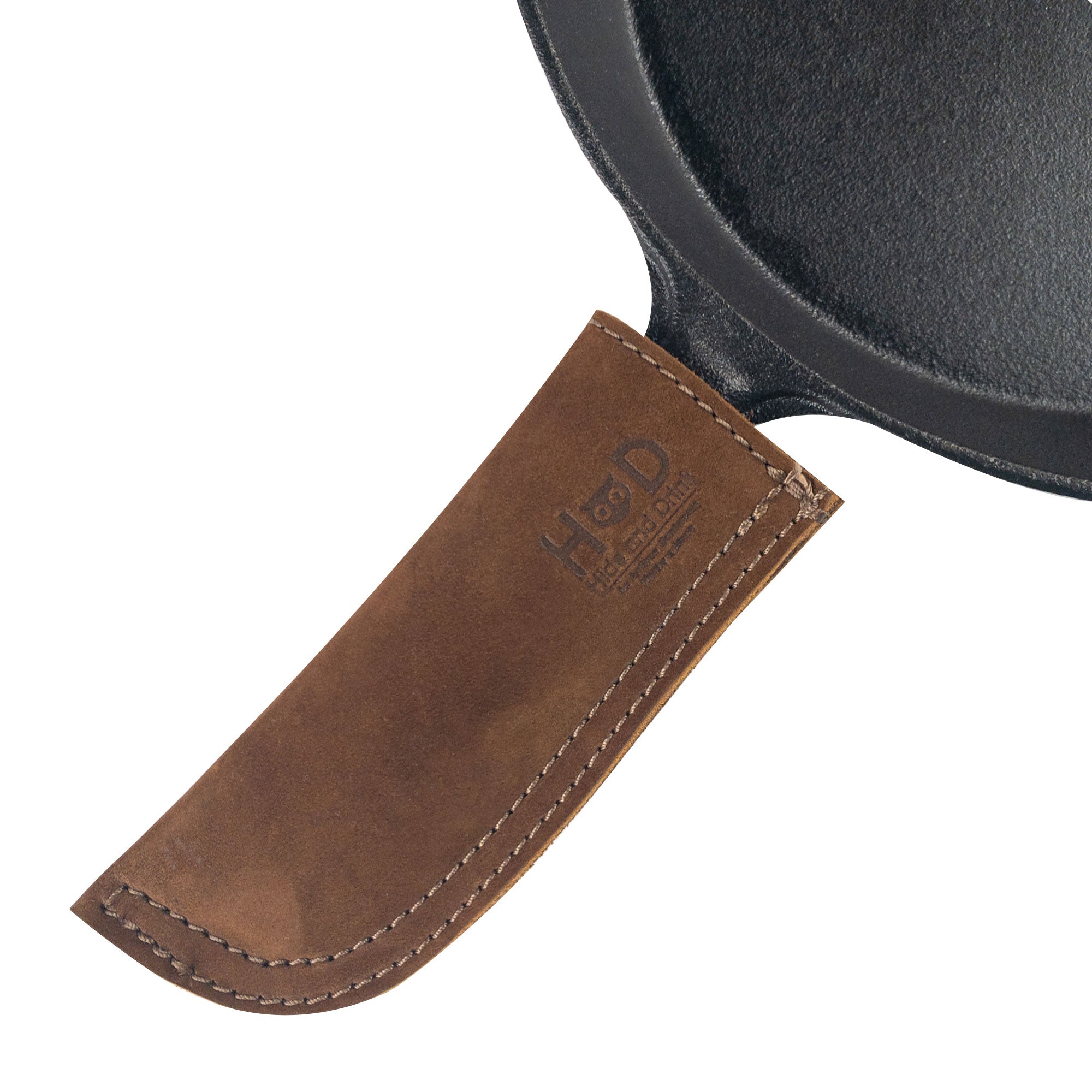 Hot Pan Handle Cover by Hide & Drink, created for a steady grip on cast iron skillets, showcasing the quality of handmade craftsmanship from La Antigua Guatemala & Oaxaca Mexico.