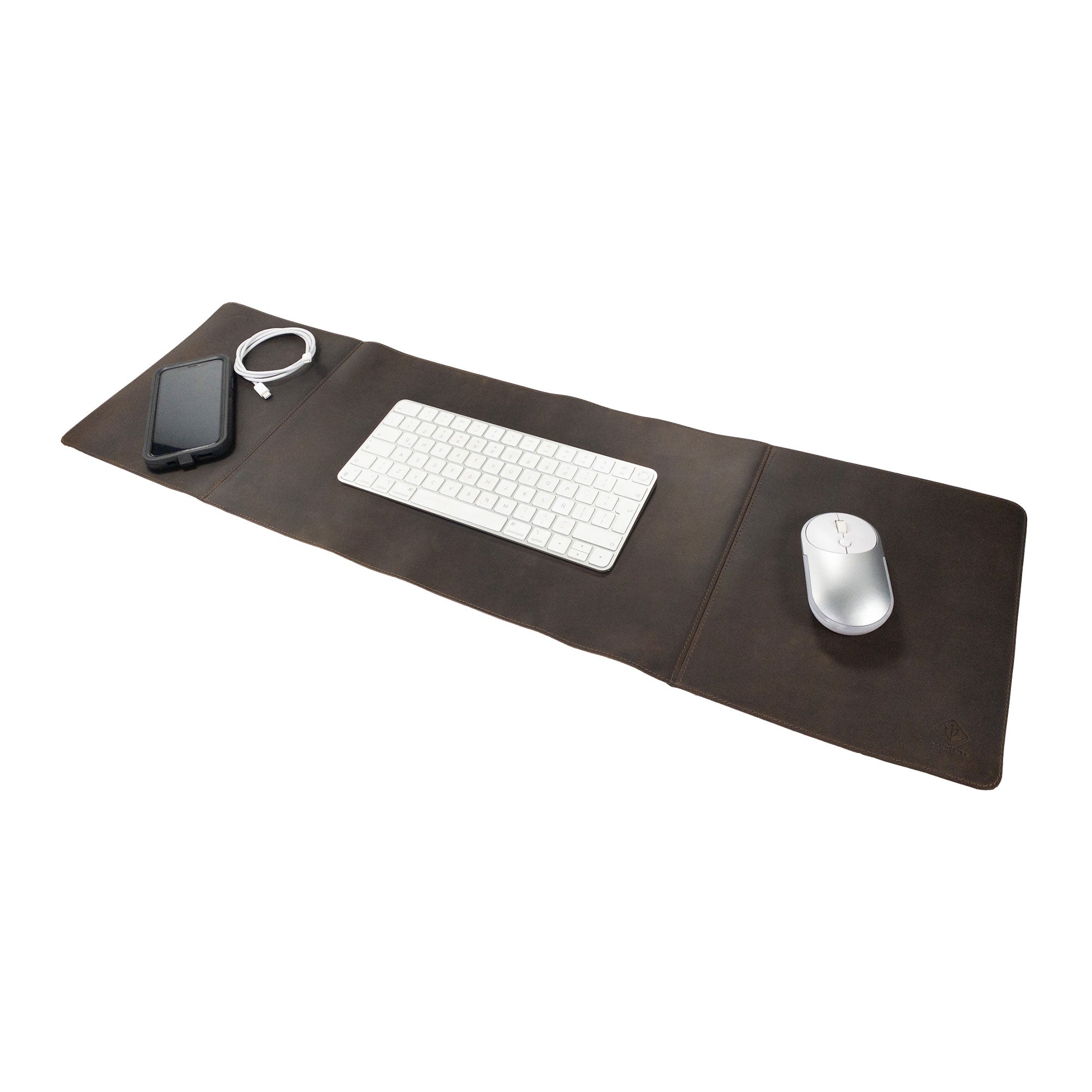 A stylish 34 Inch Long Desk Pad for Keyboard, Mouse, and Cellphone by LeatherTex, showcasing full grain leather craftsmanship ideal for desktop organization. This artisan piece, handmade in La Antigua Guatemala & Oaxaca Mexico, emphasizes small batch production with its hand cut and hand sewn details, complete with fire branding.