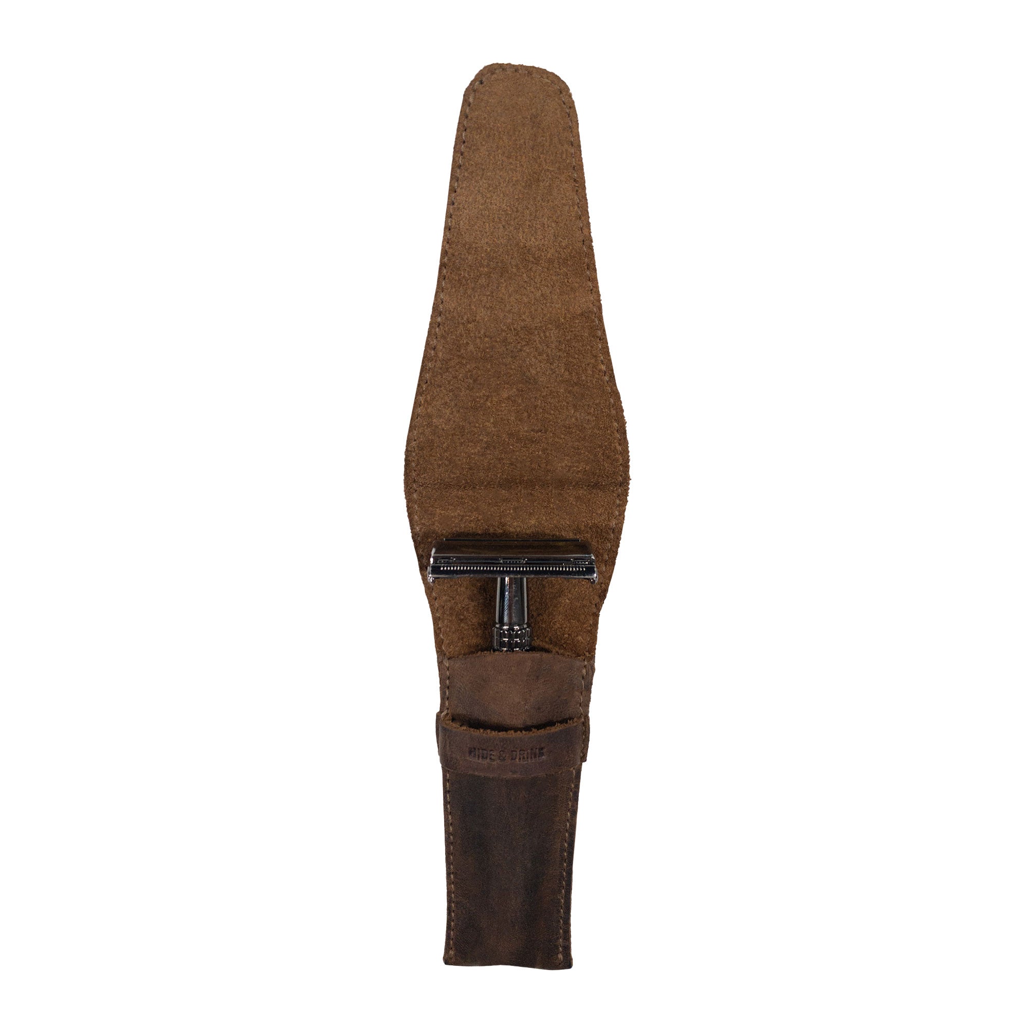 Inside view of the Safety Razor Case by Hide & Drink, featuring a soft lining made of Full Grain Leather. This handcrafted accessory is perfect for keeping your shaving tools organized while traveling, reflecting artisan dedication and quality.