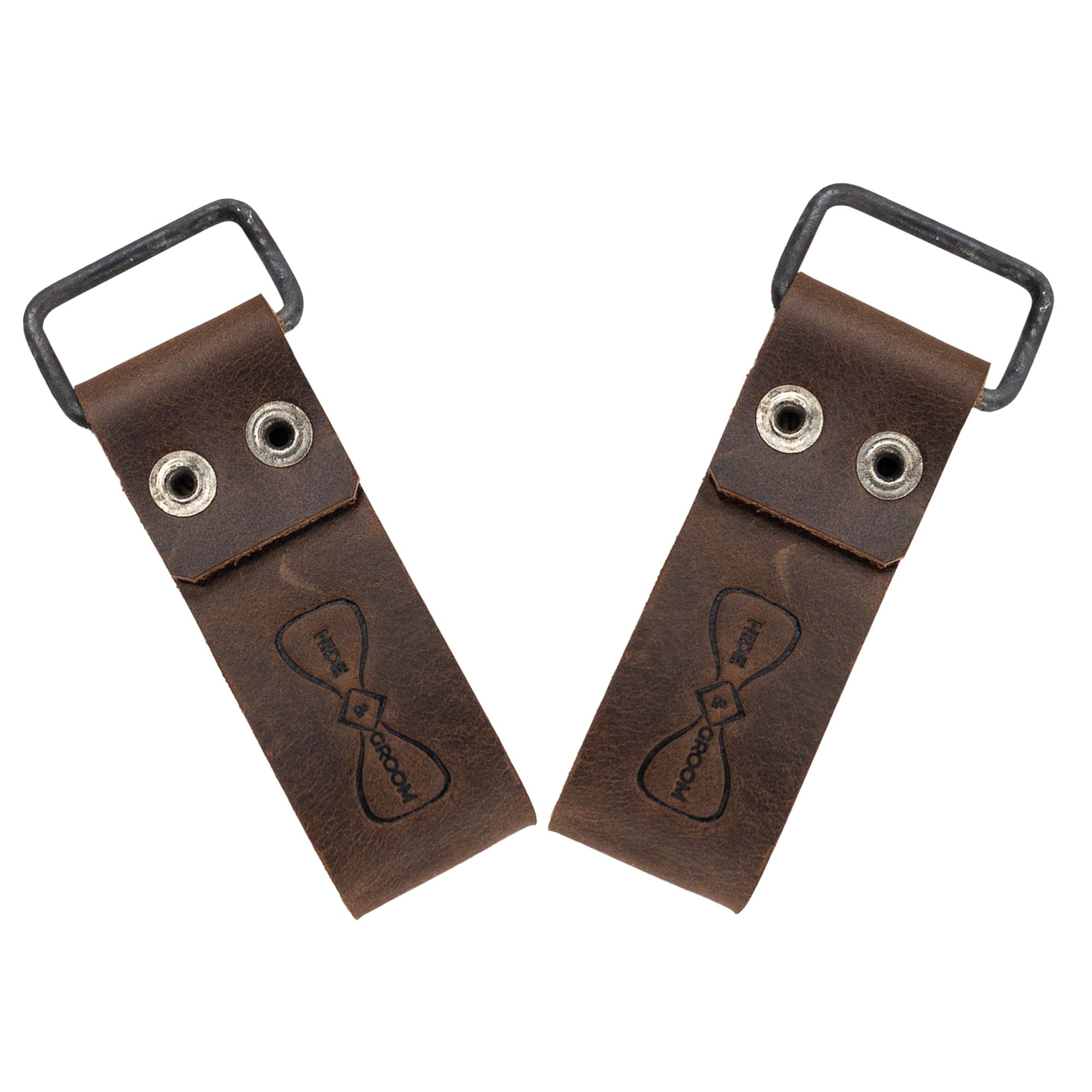 Detailed view of the Set of 2 Riveted Suspender Loop Attachments by Hide & Groom, featuring the brand's signature on the sturdy leather. These artisan, heavy-duty suspender loops are perfect as wedding accessories, handmade in La Antigua Guatemala & Oaxaca Mexico.