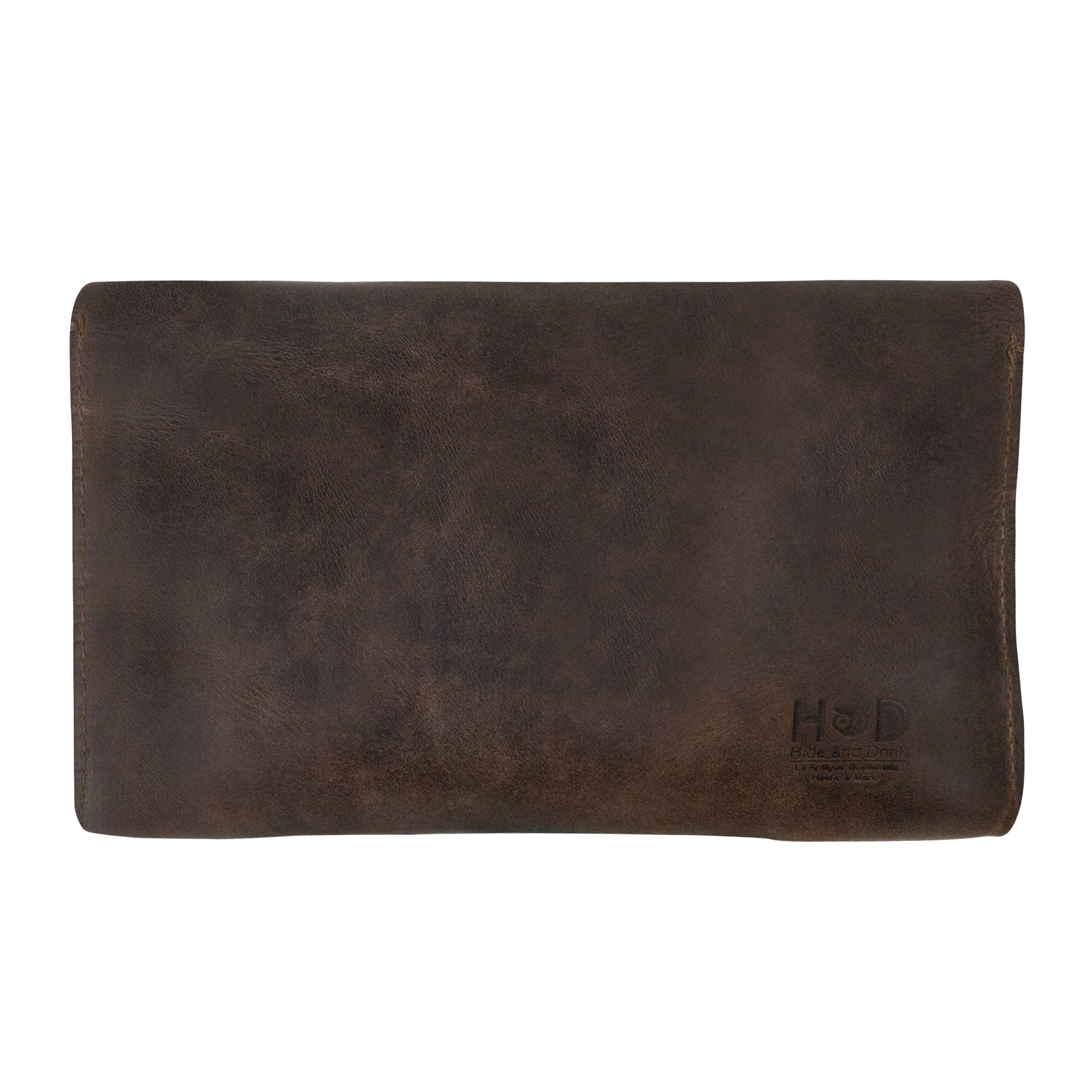 Back view of the Clutch Bag With Handle by Hide & Drink, crafted from luxurious Full Grain Leather. Perfect for women looking for a chic handbag or night bag, this artisan piece is handmade in La Antigua Guatemala & Oaxaca Mexico.