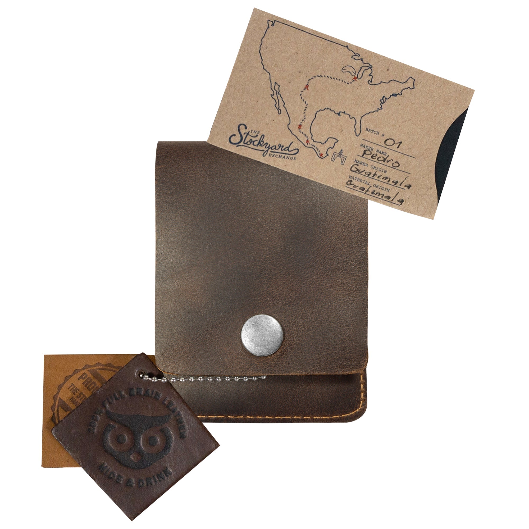 Vertical Wallet by Hide & Drink displayed with business cards, emphasizing its versatility. This Vertical Front Pocket Wallet with Card Slot is designed for compact storage of bills and cards, made of full grain leather in small batch production, featuring hand cut and hand sewn finishes with fire branded details. Handmade in La Antigua Guatemala & Oaxaca Mexico.