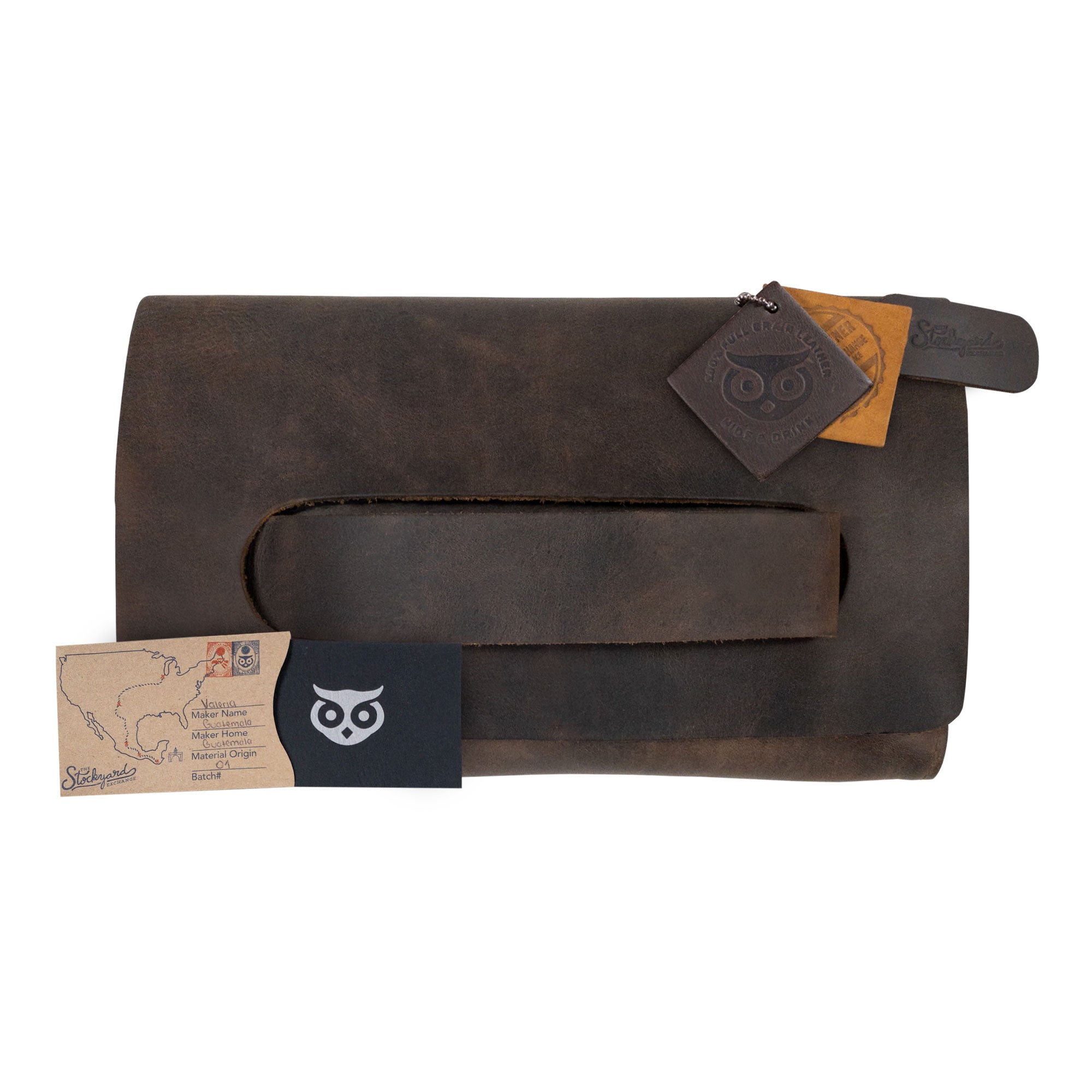 The Clutch Bag With Handle from Hide & Drink, styled with included accessories. This Full Grain Leather Clutch Bag with Handle is a great gift for women, perfect as a handbag or night bag, crafted with love in La Antigua Guatemala & Oaxaca Mexico.