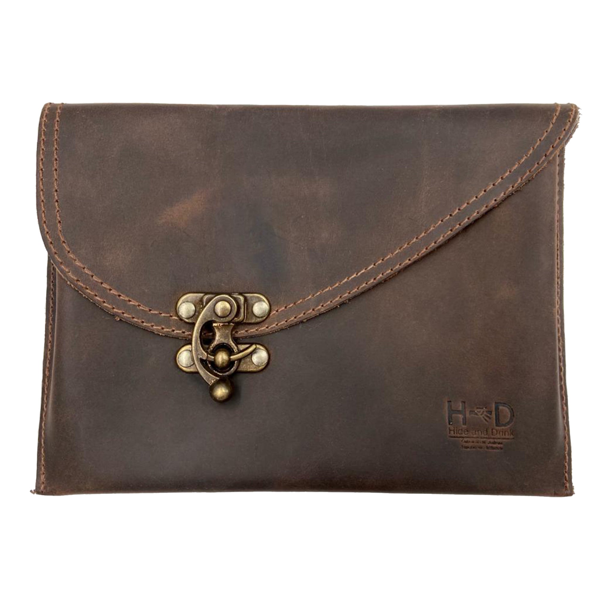 Vintage Clutch Bag from Hide & Drink made of Full Grain Leather with a unique vintage clasp, showcasing artisan craftsmanship in small batch production. Handmade in La Antigua Guatemala, featuring fire branded details.
