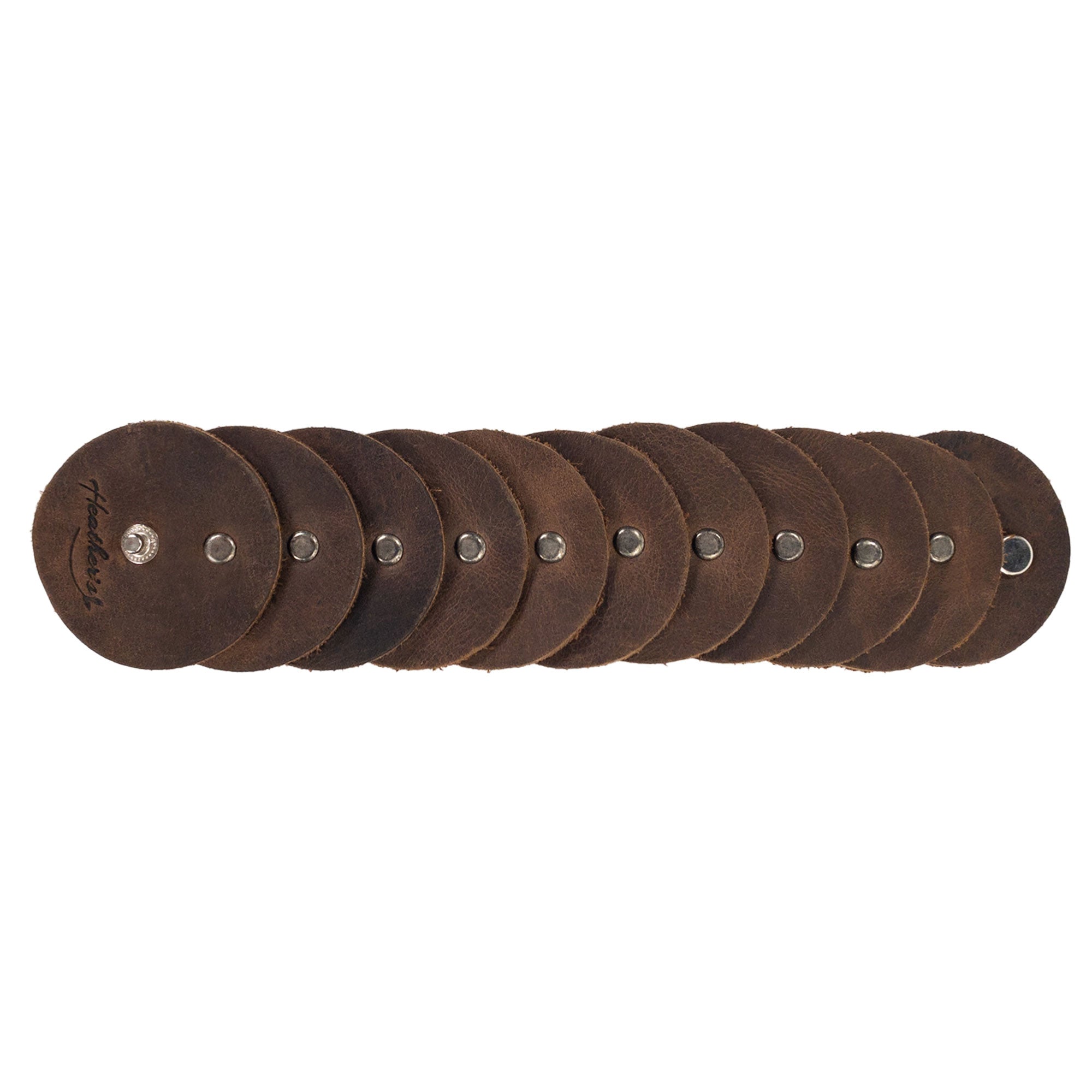 An assortment of Moon Bracelets by Heather's, showcasing Full Grain Leather in a unique design. Each piece demonstrates the essence of Small Batch Production and artisan craftsmanship with Hand Cut and Hand Sewn features, finished with Fire Branding, highlighting the heritage from La Antigua Guatemala & Oaxaca Mexico.