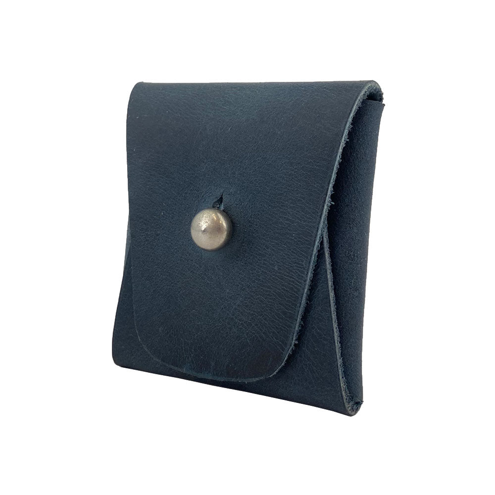 The inside of a tan Minimalist Square Coin Pouch by Hide & Drink, revealing space for coins and small items. This artisan-made pouch is crafted with high-quality full grain leather for durability and design. Minimalist Coin Pouch, SD Card Holder, Wallet and Cash Organizer, Full Grain Leather, StockyardX, Small Batch Production, Hand Cut, Hand Sewn, Fire Branded, Artisan, Handmade in La Antigua Guatemala & Oaxaca Mexico.