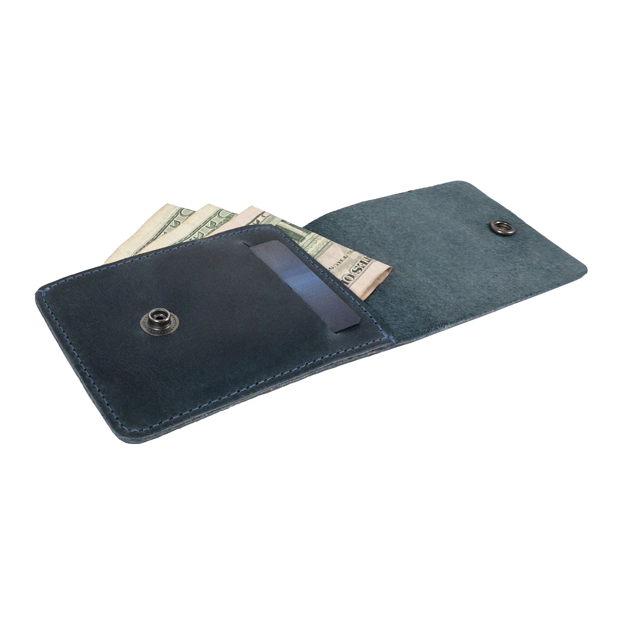 Back view of the blue Vertical Wallet by Hide & Drink featuring the embossed logo. This Vertical Front Pocket Wallet with Card Slot merges fashion with function, enabling compact storage for bills and cards, crafted from full grain leather utilizing small batch production techniques, hand cut, and hand sewn with fire branding. Handmade in La Antigua Guatemala & Oaxaca Mexico.