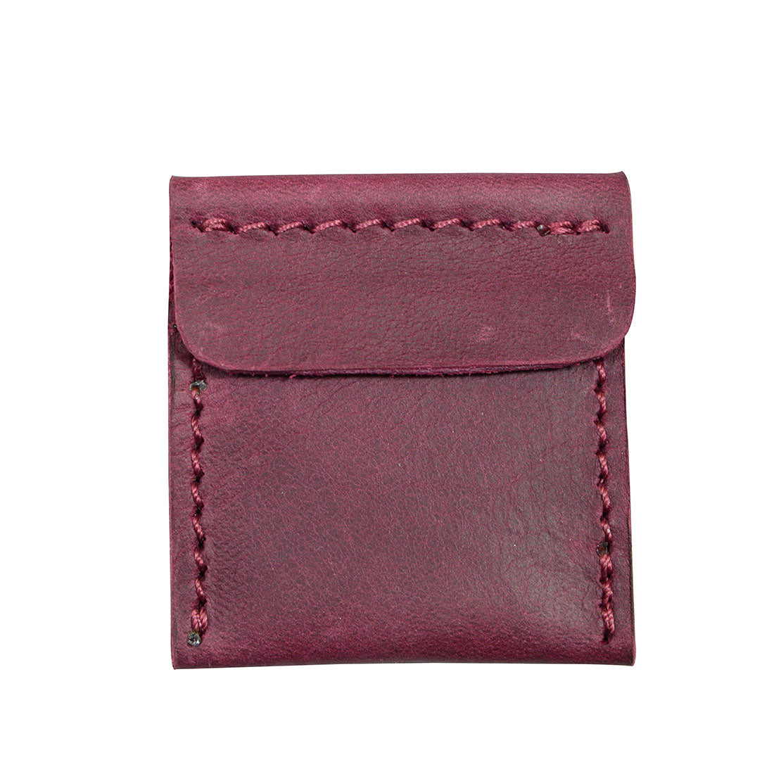 Hide & Drink Wedding Ring Case displaying an engagement ring within its soft leather confines. A perfect pouch organizer for jewelry, this small batch production piece is expertly crafted in La Antigua Guatemala & Oaxaca Mexico.