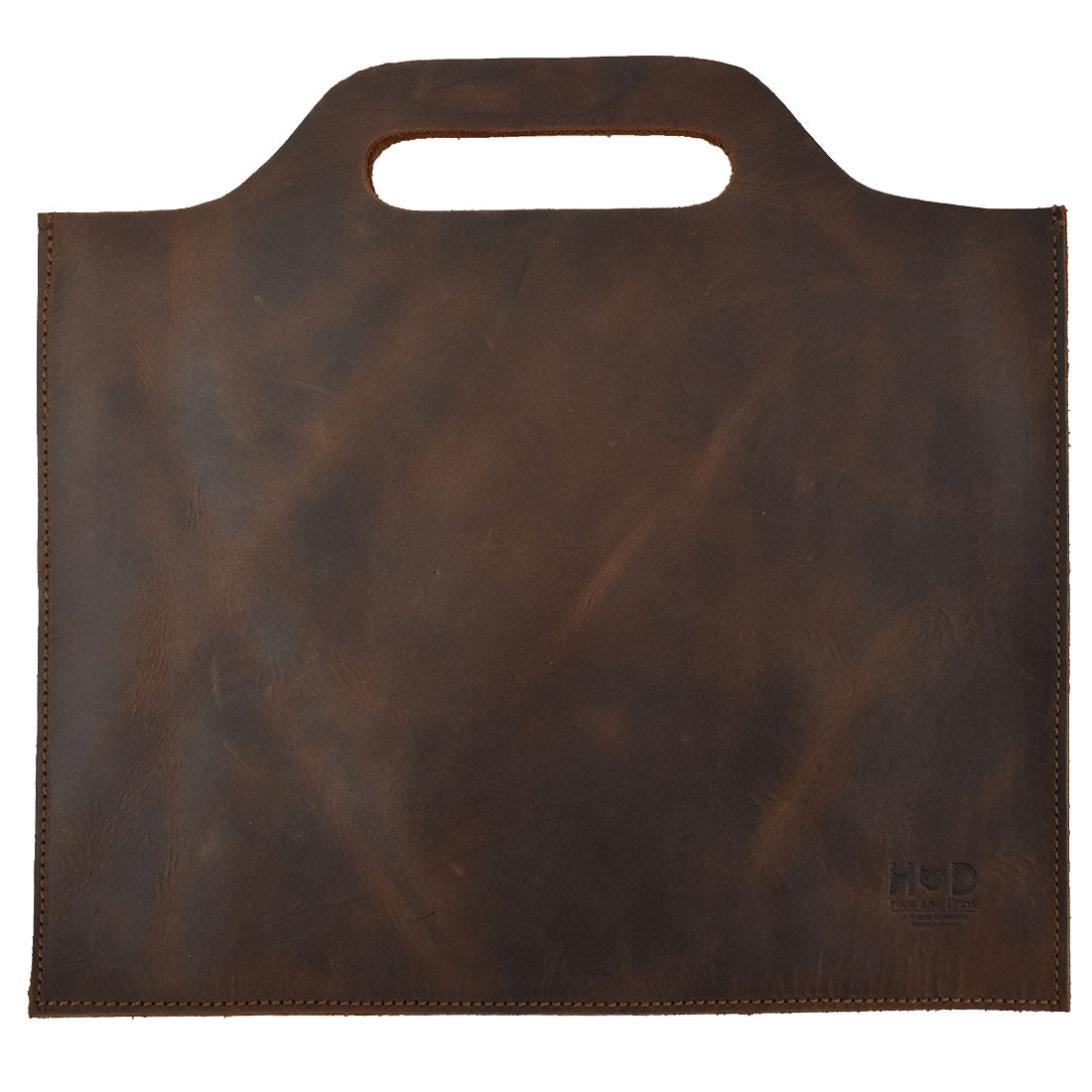 Flat Handbag by Hide & Drink in rich brown full grain leather, showcasing a simple and elegant design, perfect as a minimalist style carry-on bag, thin portfolio, or classic document holder. This travel accessory is crafted with care using small batch production and features hand cut and hand sewn details. Each piece is fire branded, highlighting its artisan quality, all handmade in La Antigua Guatemala & Oaxaca Mexico.