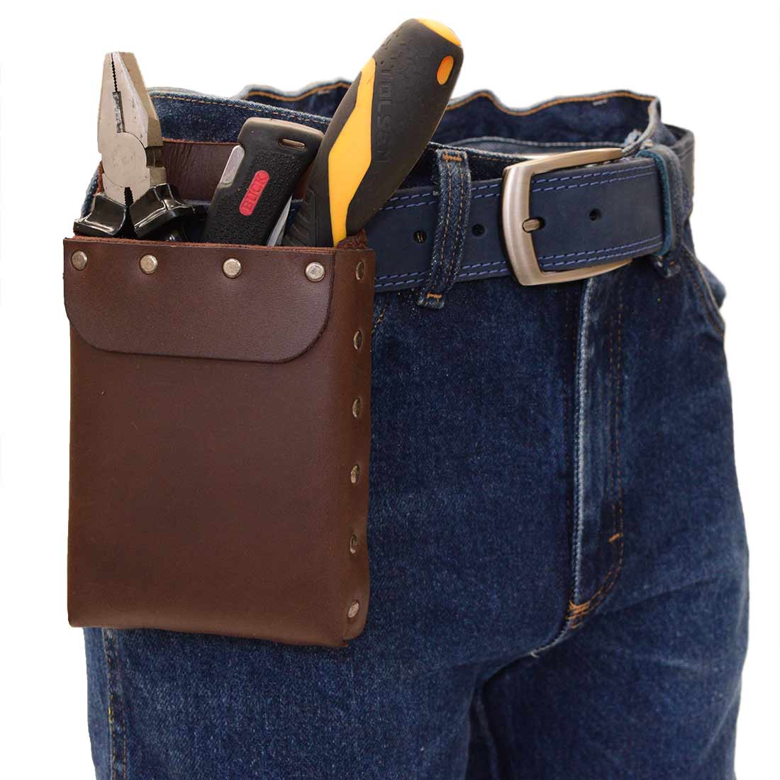 Hide & Drink's Square Tool Pouch, a riveted squared tool pouch for waist belt, showcases a heavy-duty case with tools like pliers and screwdrivers. Crafted from rustic full grain leather, this artisan-made product reflects small batch production in La Antigua Guatemala. Perfect tool organizer, hand cut and hand sewn for durability.
