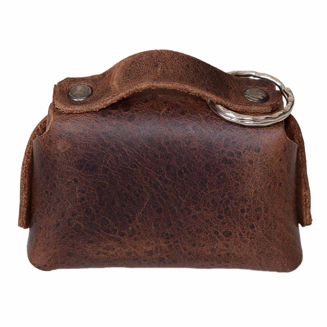Back view of the Tiny Handbag Keychain, emphasizing its sleek design and key ring holder, created with full grain leather by Hide & Drink. This Tiny Handbag with Key Ring Holder represents small batch production, hand cut, hand sewn, and fire branded artistry, all handmade in La Antigua Guatemala & Oaxaca Mexico.