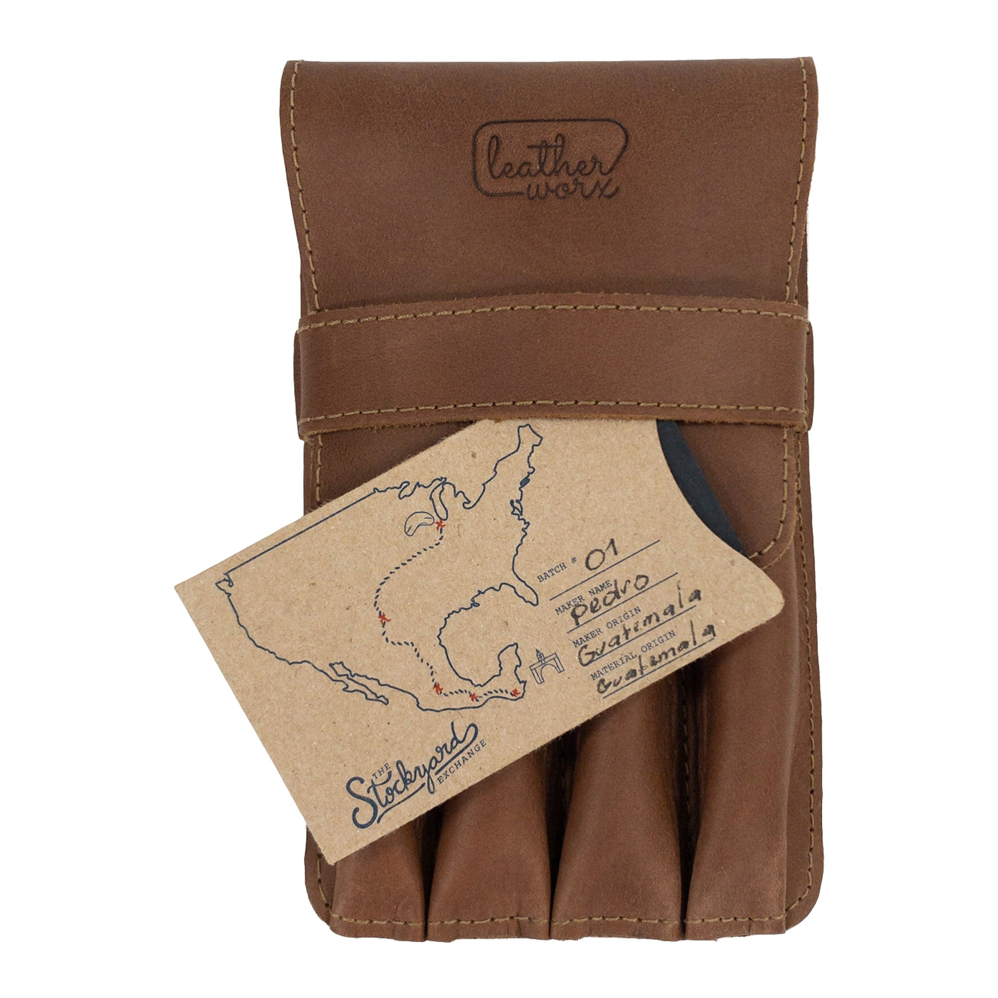 Leather Worx 4-Pen Holder in light brown alongside a gift card from The Stockyard Exchange, merging functionality with artisan craftsmanship. This classic storage solution is a perfect blend of style, featuring fire branding and hand sewn quality made in La Antigua Guatemala.