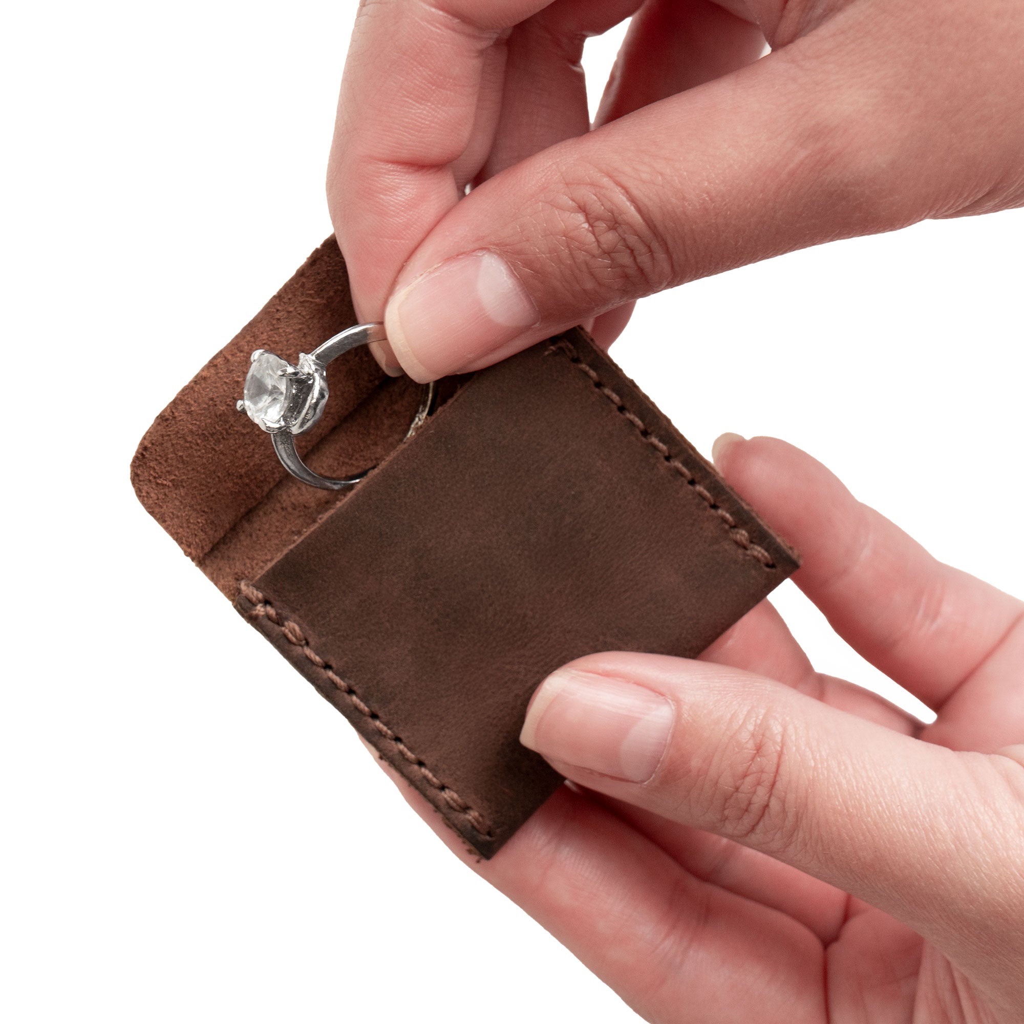 Handcrafted Wedding Ring Case by Hide & Groom, made from premium Full Grain Leather. This artisan piece reflects small batch production, is hand cut and hand sewn, with fire branding that adds to its rustic charm, ideal for securing wedding rings.