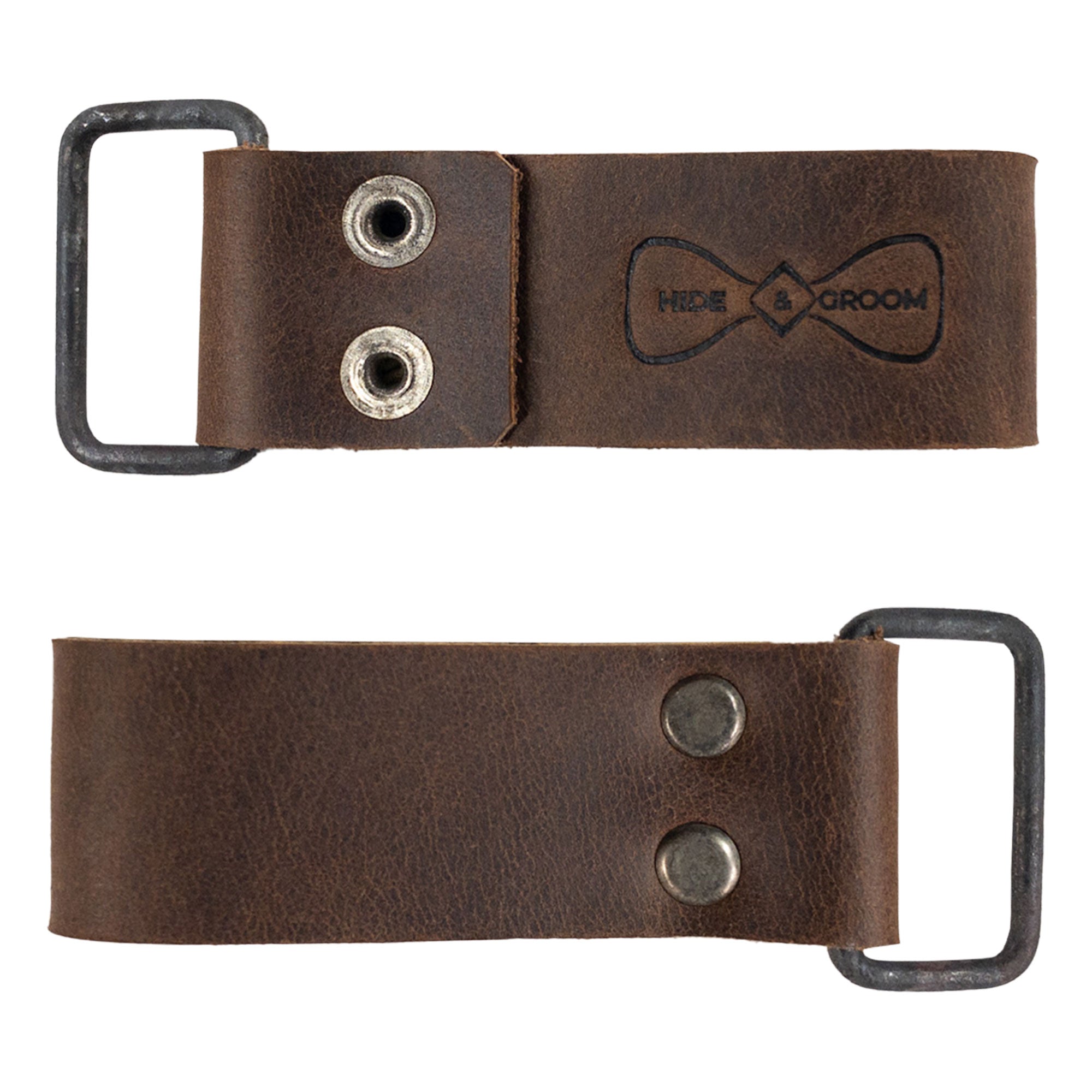 Showcasing the Set of 2 Riveted Suspender Loop Attachments by Hide & Groom, with a focus on the practical design and high-quality materials. A great choice for men needing heavy-duty wedding accessories, these artisan pieces are crafted by hand in La Antigua Guatemala & Oaxaca Mexico.