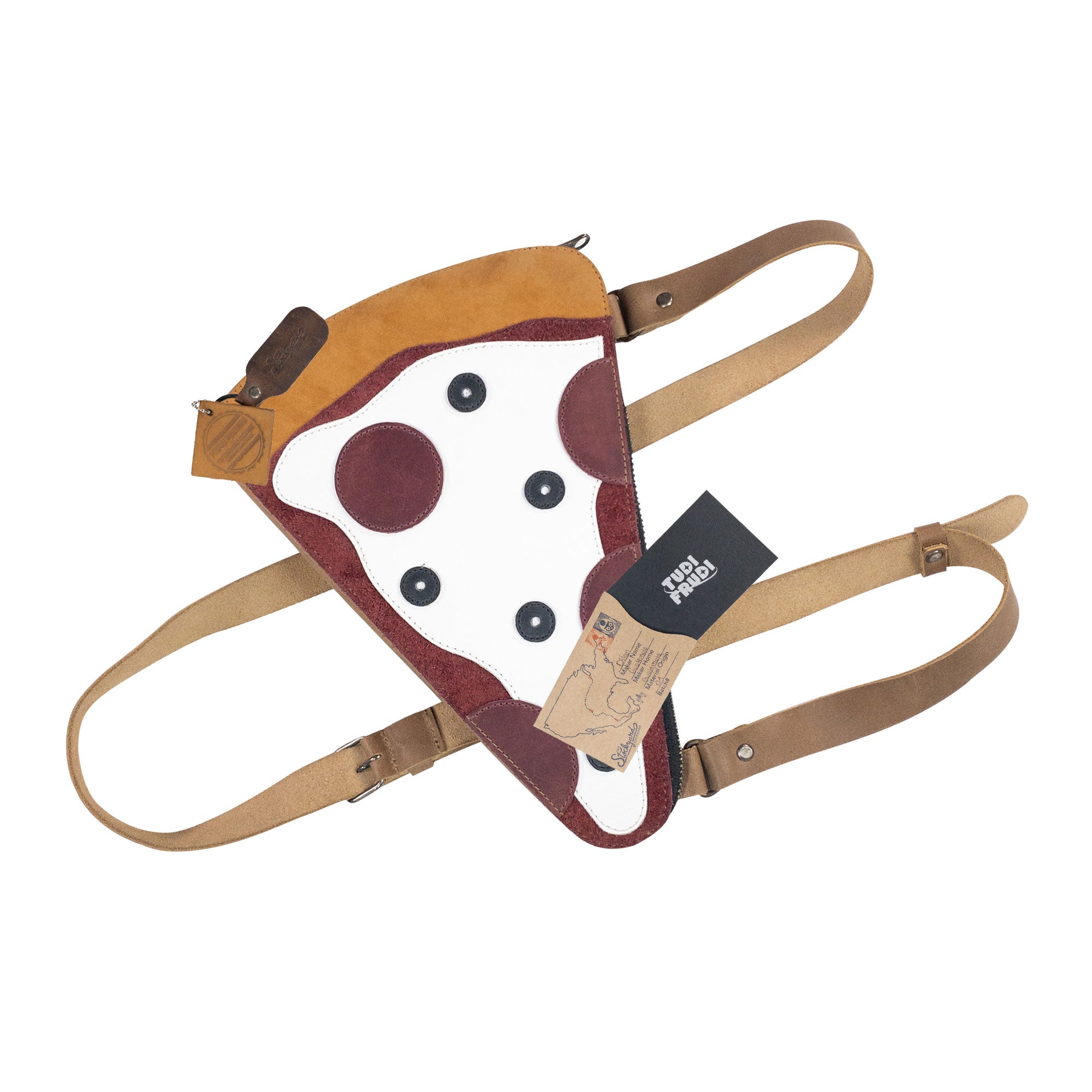 Back view of the Pizza Slice-Shaped Shoulder Bag by Tudi Frudi showing its unique pizza slice shape and Full Grain Leather textures. This artisan-made crossbody bag exemplifies small batch production and attention to detail in hand cut and hand sewn work.