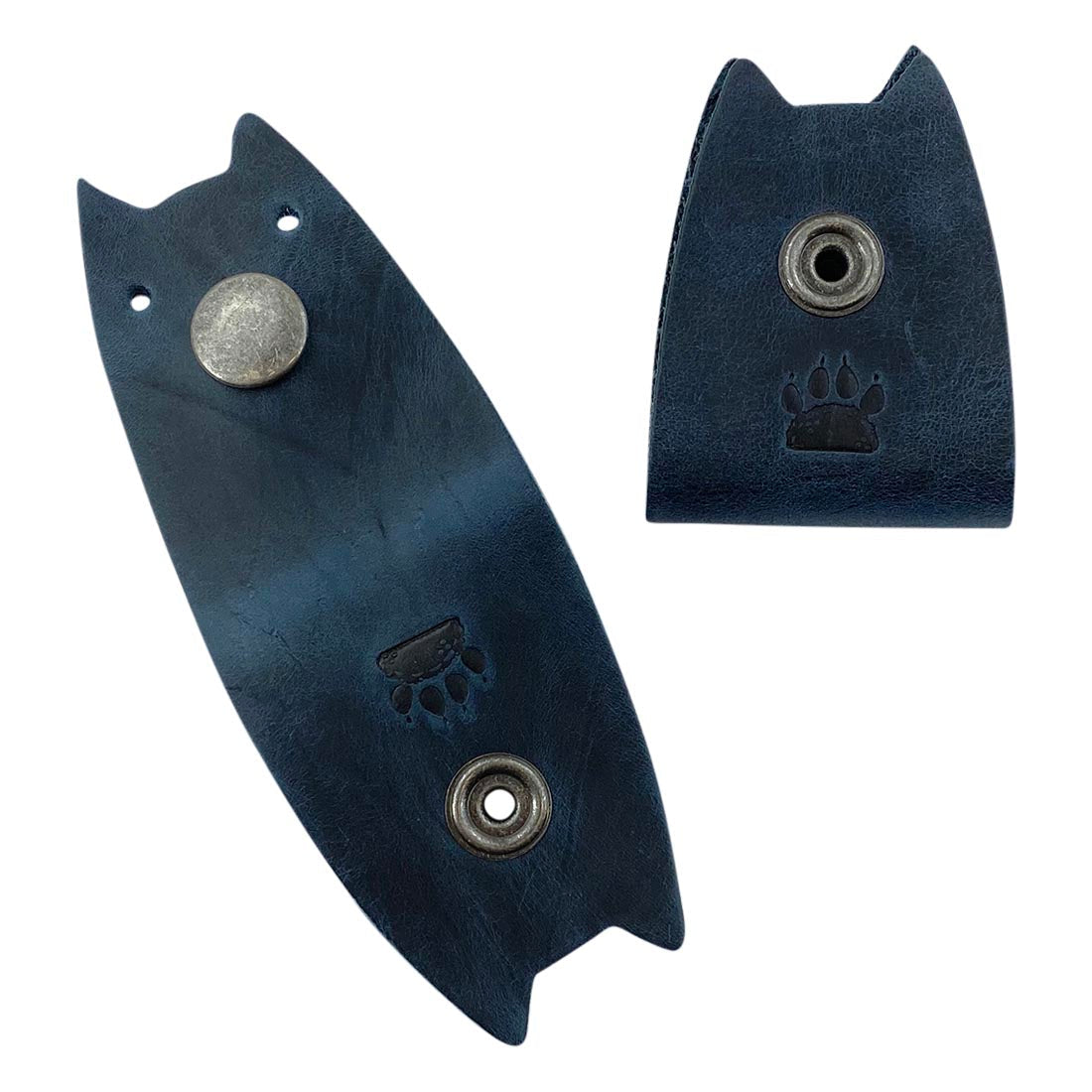 Navy Taco Dog Cat Cord Keeper (2 Pack) showcased with cable management features. Combines functionality and style, effectively organizing your earbuds and headphones. Expensively made in La Antigua Guatemala & Oaxaca Mexico.