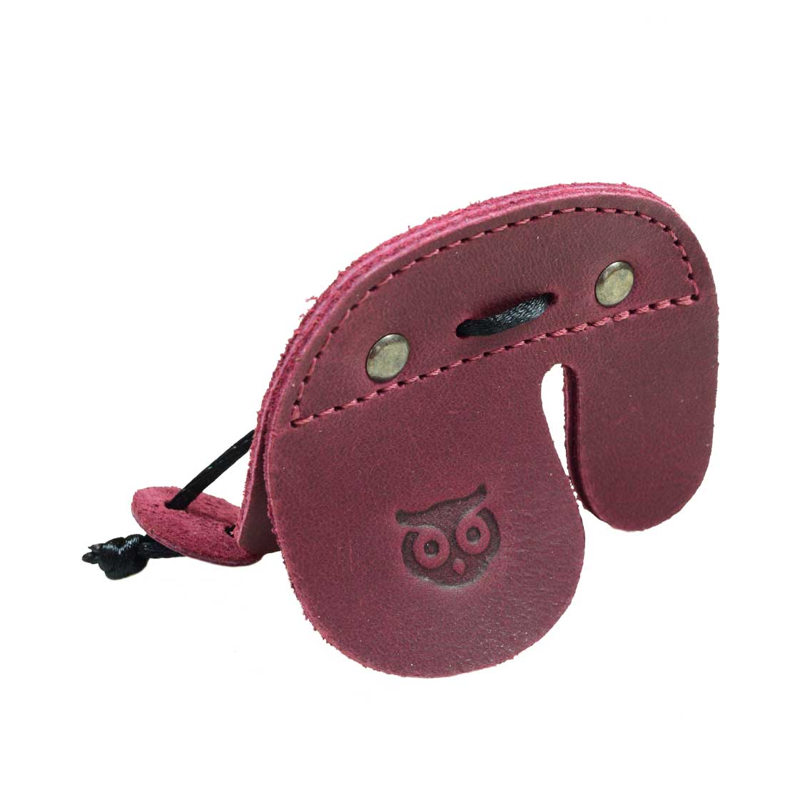 The Hide & Drink Left Handed Archery Finger Protector is elegantly showcased amidst a backdrop. This Archery Finger Tab serves as your perfect Protect Guard for Recurve Bows, crafted from elegant Full Grain Leather. It is a fantastic component for shooting practice gear, artisanal and handmade to perfection by StockyardX.