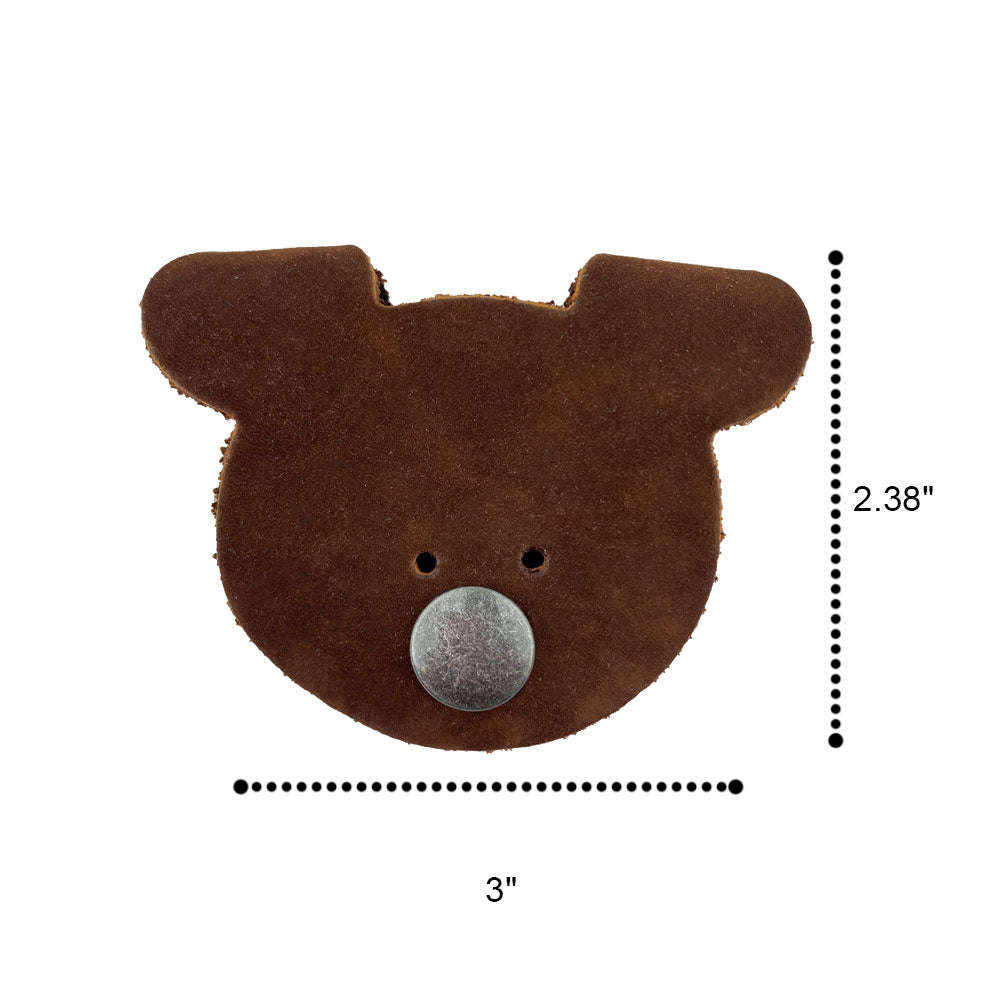 Dimensions and details of a Bear Shaped Cord Keeper (Cord Clam) by Hide & Drink, highlighting the quality Full Grain Leather craftsmanship. Handmade in La Antigua Guatemala & Oaxaca Mexico, representing artisan small batch production.
