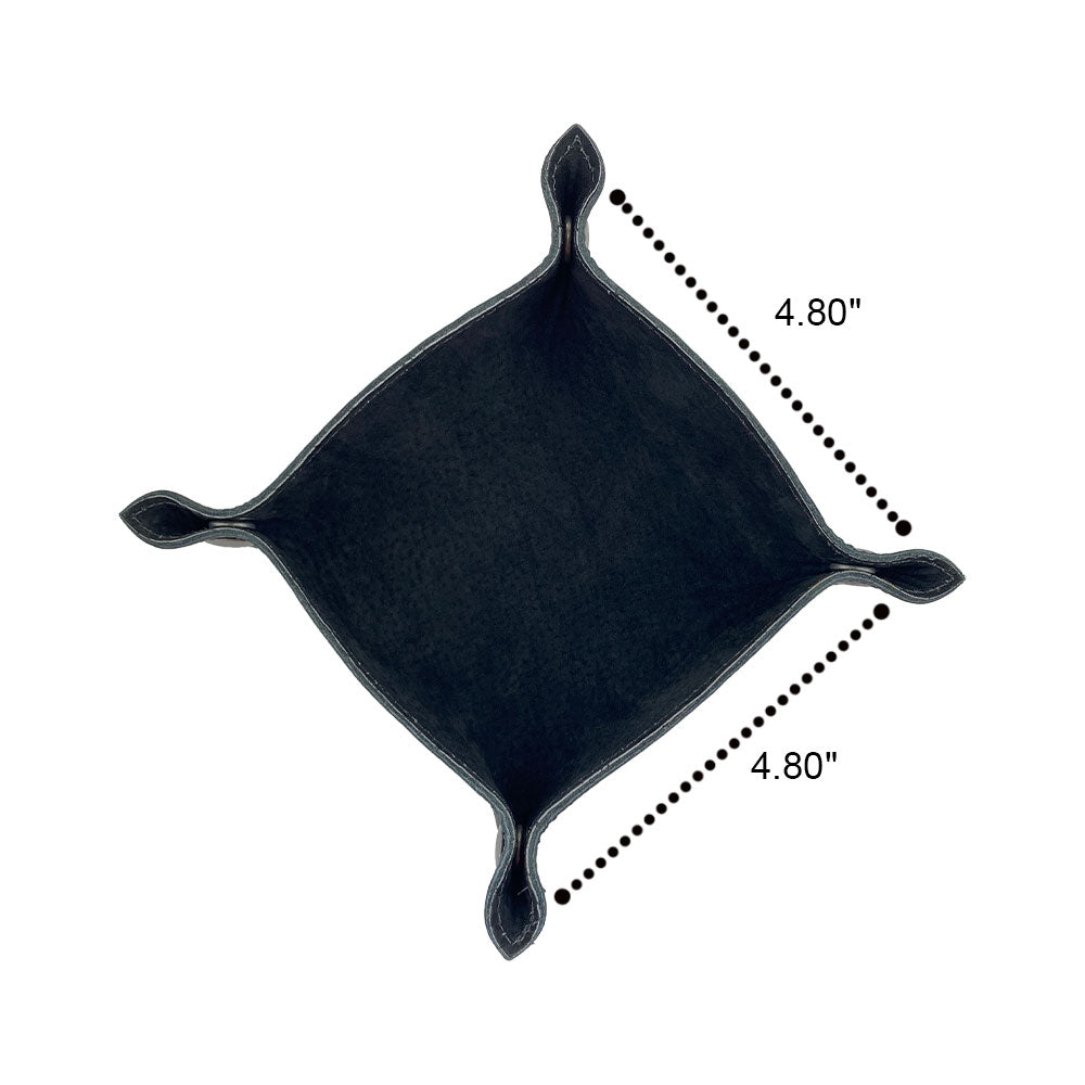 Overhead view of the Valet Tray with Sheep Skin from Hide & Drink, measuring 4.80 inches square. This stylish tray is the perfect small batch produced storage valet for personal items, designed for both home use and travel essentials. Made with artisan craftsmanship in La Antigua Guatemala & Oaxaca Mexico, incorporating full grain leather and sheepskin.